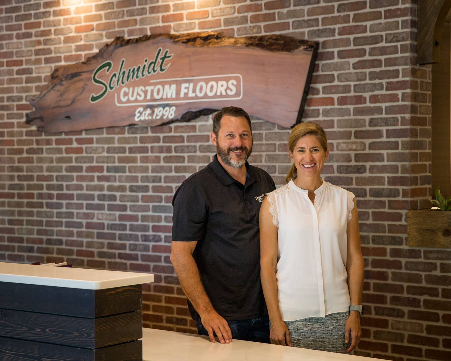 Barry and Alyssa Schmidt in the Loveland showroom